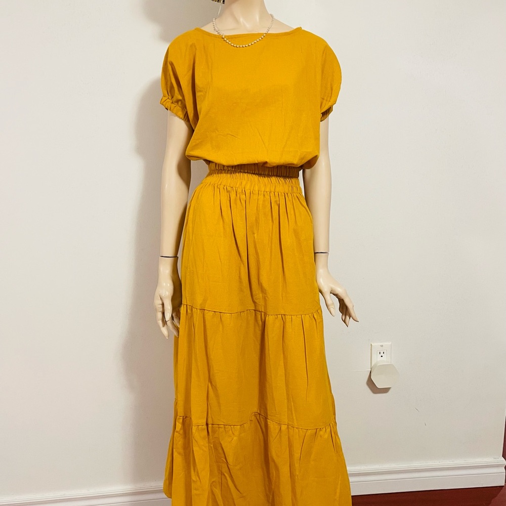 Set skirt and top.Can fit up to large for the top.Bust size 44cm NWOT